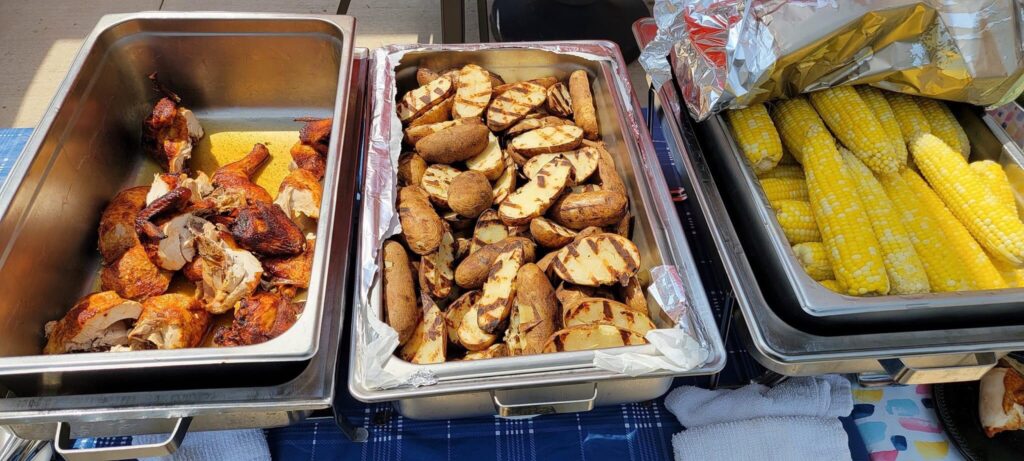 Chef Carlos created a wonderful barbecue meal for residents that included grilled chicken, broccoli salad and corn on the cob.