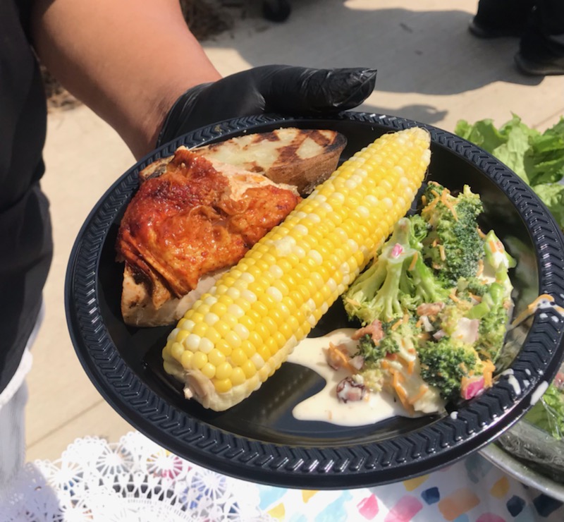 Chef Carlos created a wonderful barbecue meal for residents that included grilled chicken, broccoli salad and corn on the cob.