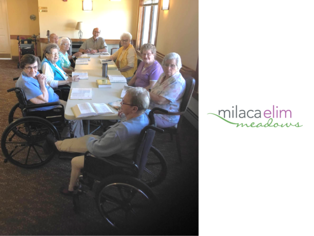 Pastor Dale Clifton leads a worship session with residents.