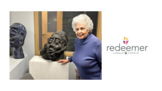 Redeemer Health Care Center resident Lydia Wardlaw-Brown poses with her sculptures for a picture.
