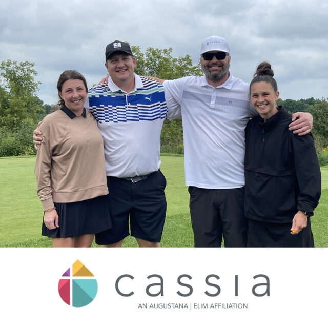 A group of four people pose together, smiling on the green at the 2024 Cassia Golf Tournament. They are dressed in casual golf attire with their arms around each other. Below the photo is the Cassia logo.
