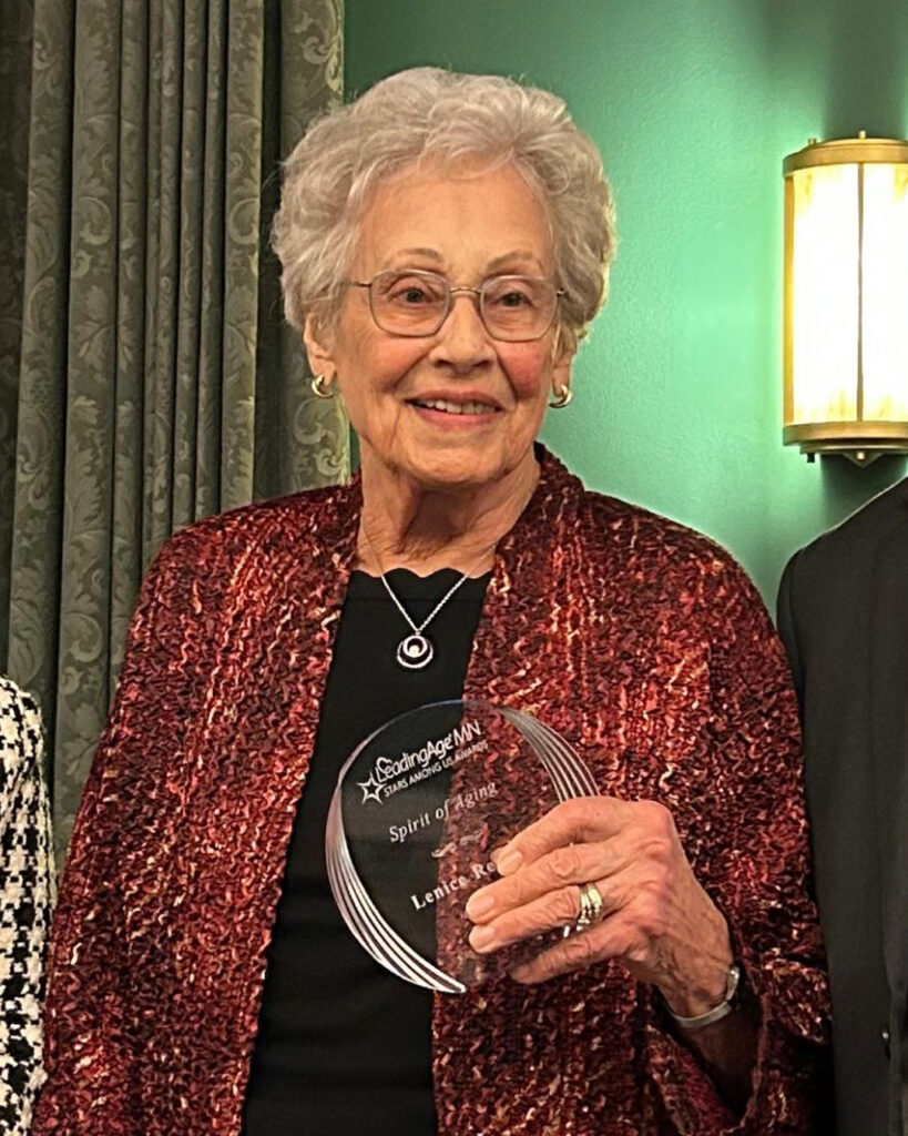 Lenice Renner, Praha Village resident and Spirit of Aging Award recipient, smiling with award.