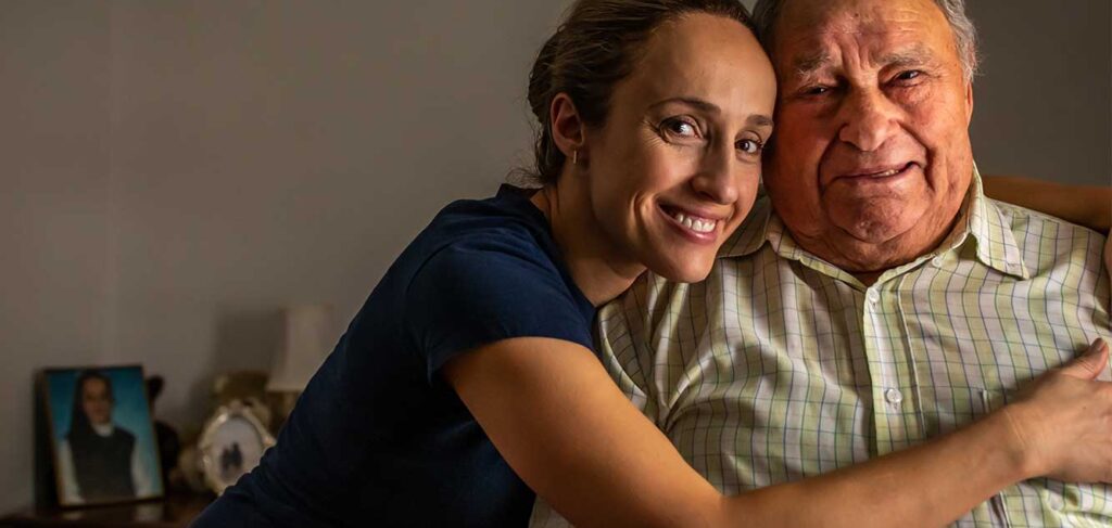 Resident and daughter share a happy moment at Cornerstone Assisted Living in Plymouth, MN.