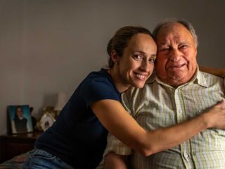 Resident and daughter share a happy moment at Cornerstone Assisted Living in Plymouth, MN.