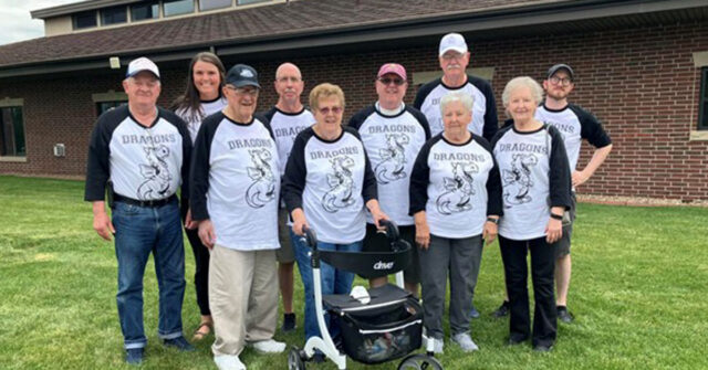 The beanbag baseball players together smiling