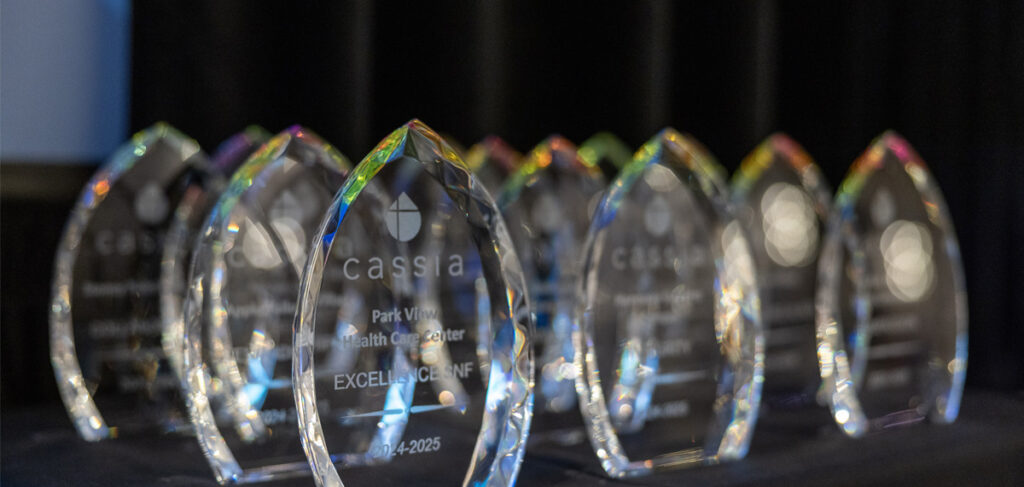 Cassia Annual Awards crystal trophies displayed at the 2026 Cassia Conference, recognizing excellence across senior living communities and services