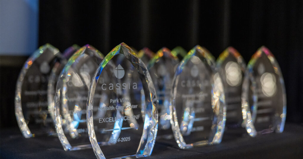 Cassia Annual Awards crystal trophies displayed at the 2026 Cassia Conference, recognizing excellence across senior living communities and services