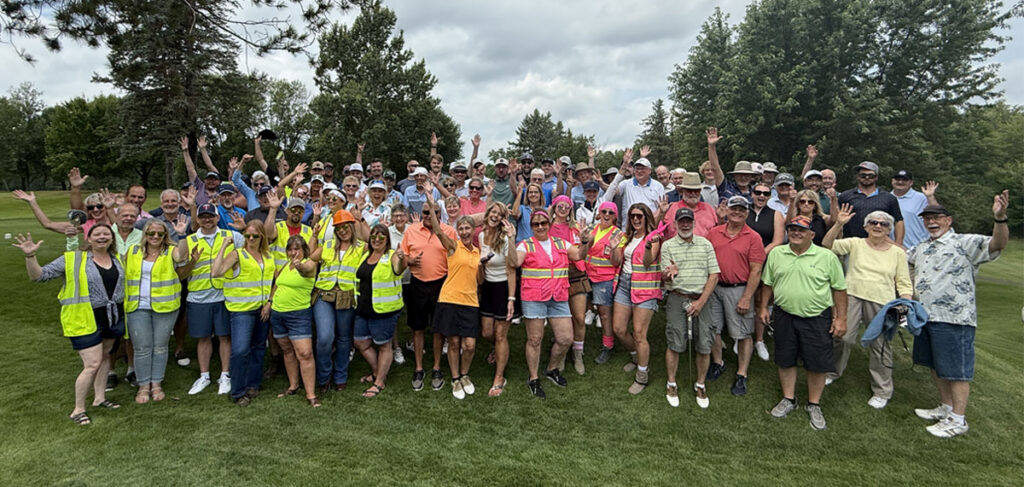 Participants and volunteers gather for a group photo at the 2026 Milaca Elim Meadows Golf Classic at Stones Throw Golf Course.