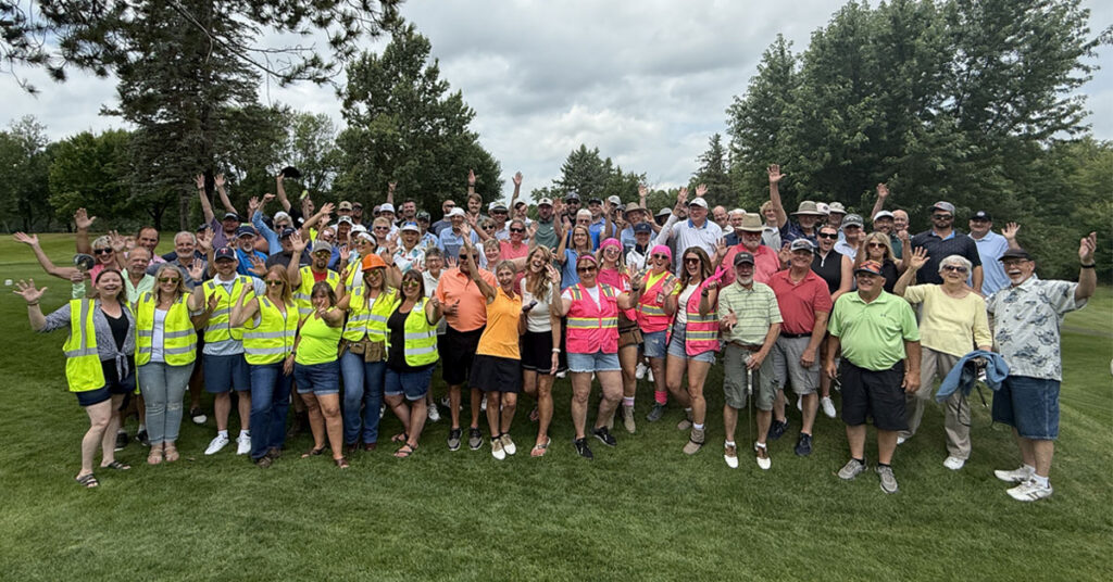 Participants and volunteers gather for a group photo at the 2026 Milaca Elim Meadows Golf Classic at Stones Throw Golf Course.