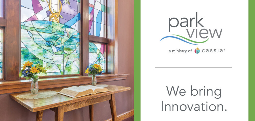 Park View promotional graphic featuring a stained-glass chapel window, a wooden table with an open book and flowers, and the text “We bring Innovation.”