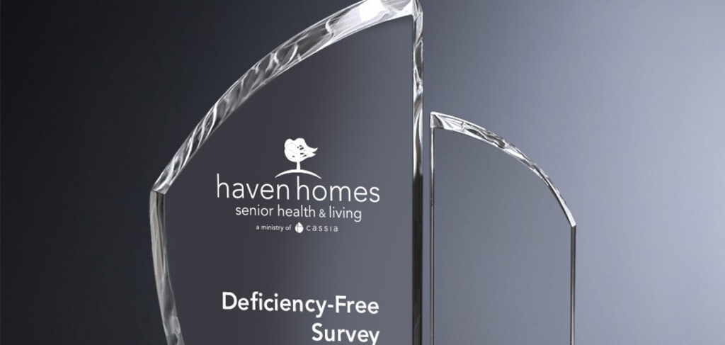 Glass award displaying the Haven Homes Senior Health & Living logo and the words “Deficiency-Free Survey,” recognizing the community’s achievement in quality care and compliance.
